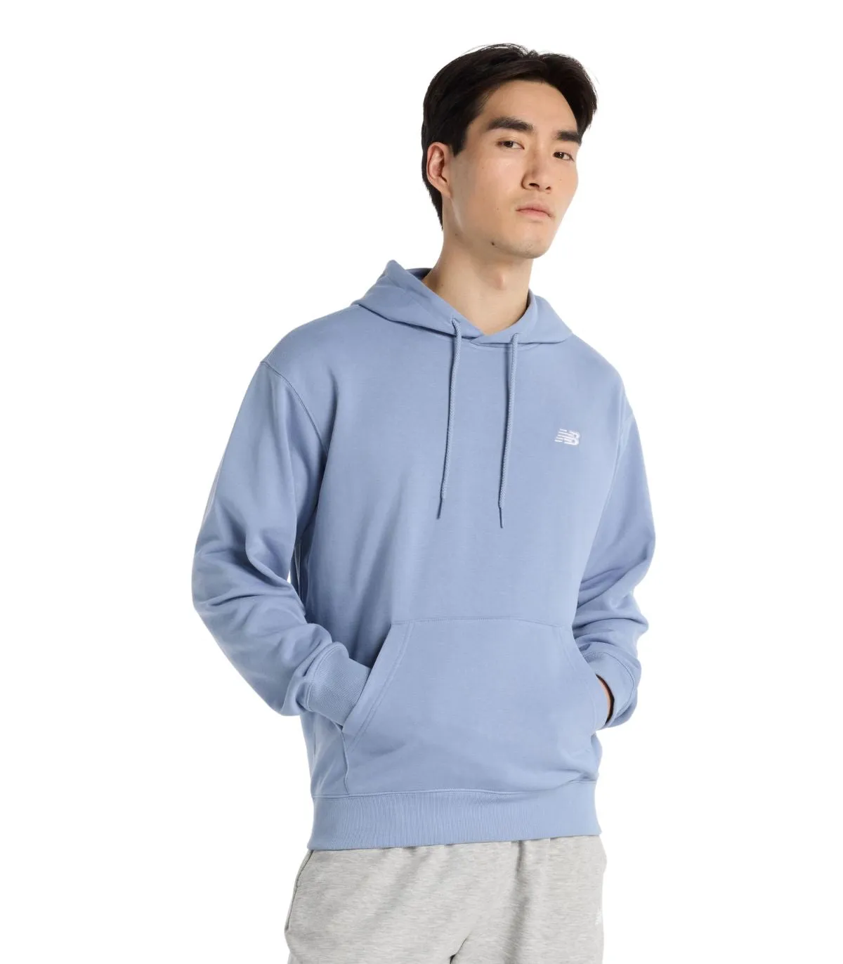 NEW BALANCE SPORT ESSENTIALS FRENCH TERRY HOODIE | SUDADERA CON CAPUCHA